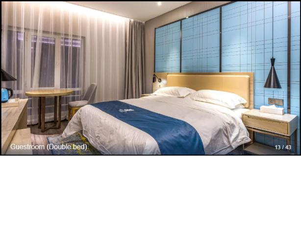 Imagen de la habitación del Hotel ECHARM HOTEL (BEIJING YIZHUANG). Foto 2