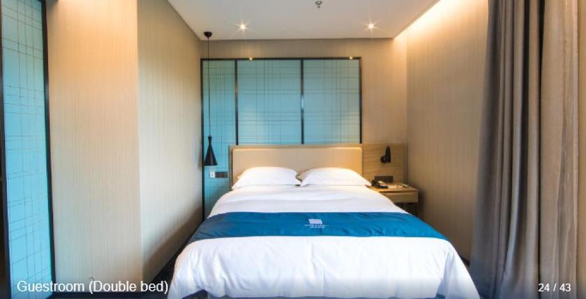 Imagen de la habitación del Hotel ECHARM HOTEL (BEIJING YIZHUANG). Foto 5