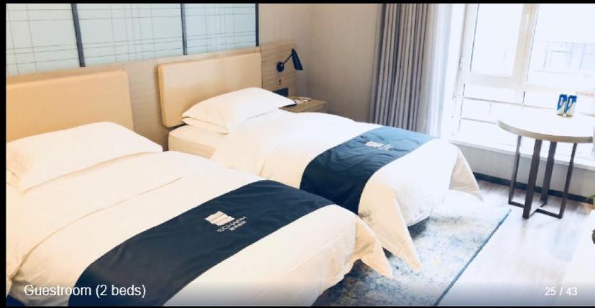 Imagen de la habitación del Hotel ECHARM HOTEL (BEIJING YIZHUANG). Foto 7
