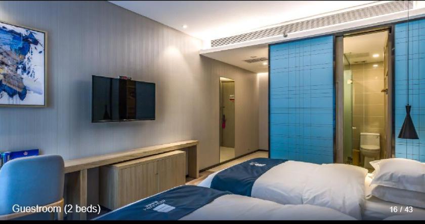 Imagen de la habitación del Hotel ECHARM HOTEL (BEIJING YIZHUANG). Foto 10