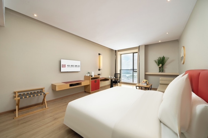 Imagen de la habitación del Hotel ECHENG Liuzhou Wuxing Buxingjie. Foto 3