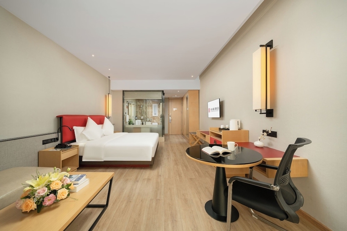 Imagen de la habitación del Hotel ECHENG Liuzhou Wuxing Buxingjie. Foto 4