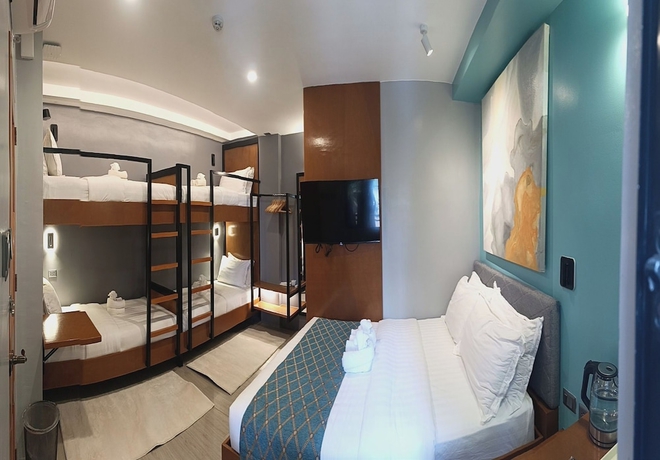 Imagen de la habitación del Hotel ECL Travellers Inn. Foto 9