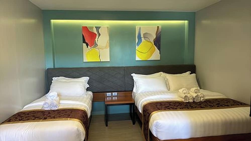 Imagen de la habitación del Hotel ECL Travellers Inn. Foto 10