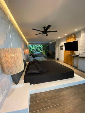 Imagen de la habitación del Hotel ECOPARADISE. Foto 15