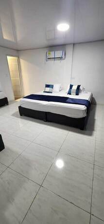 Imagen de la habitación del Hotel EDIFICIO REGATA INN. Foto 15