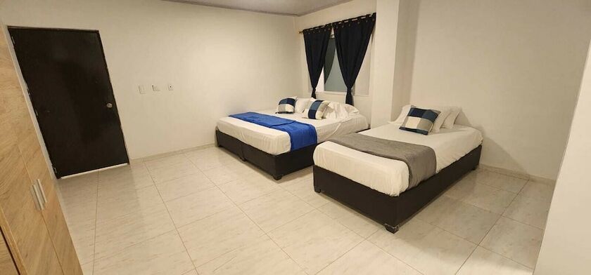 Imagen de la habitación del Hotel EDIFICIO REGATA INN. Foto 19