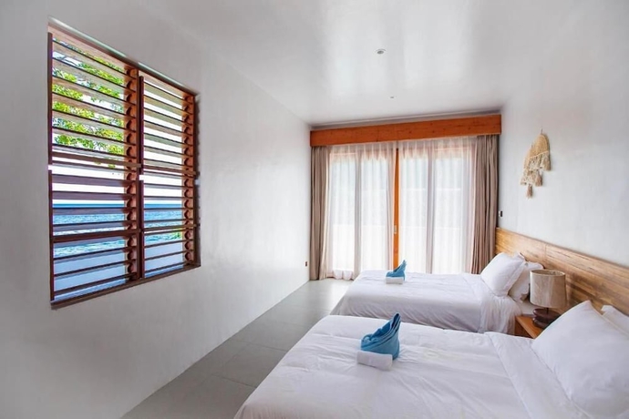 Imagen de la habitación del Hotel E-Fun Dive Resort. Foto 6