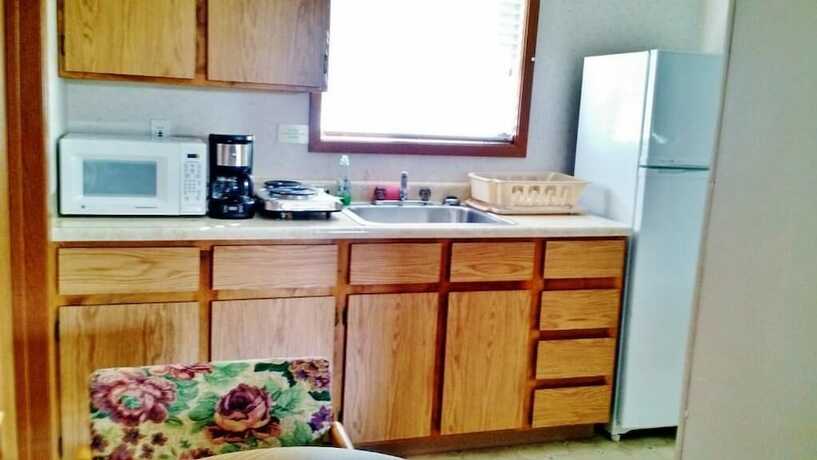 Imagen de la habitación del Hotel EGM Cabins and Apartments. Foto 14