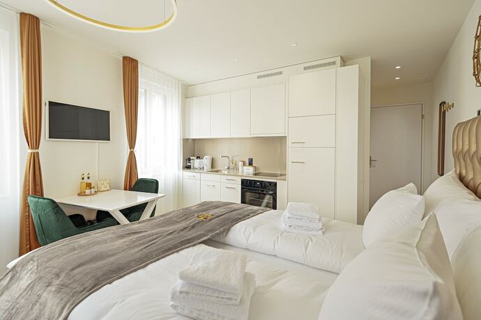 Imagen de la habitación del Hotel EH Apartments Merkur. Foto 11