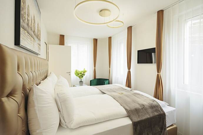 Imagen de la habitación del Hotel EH Apartments Merkur. Foto 13
