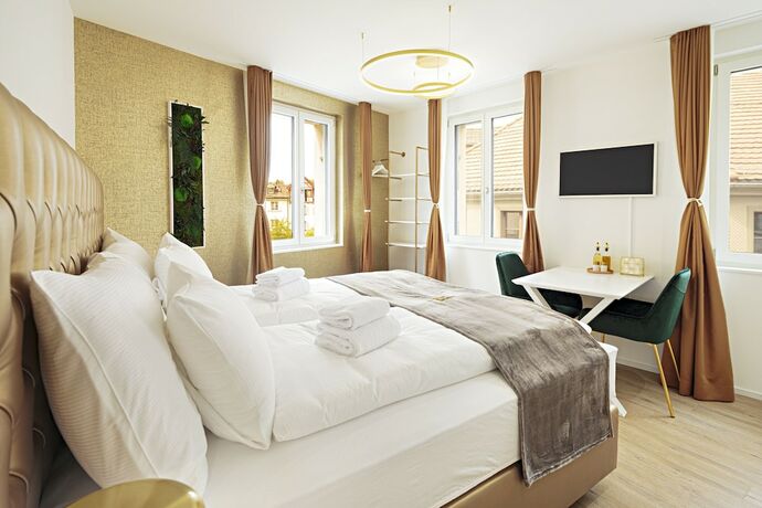 Imagen de la habitación del Hotel EH Apartments Merkur. Foto 15