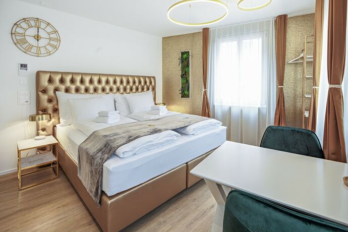 Imagen de la habitación del Hotel EH Apartments Merkur. Foto 18