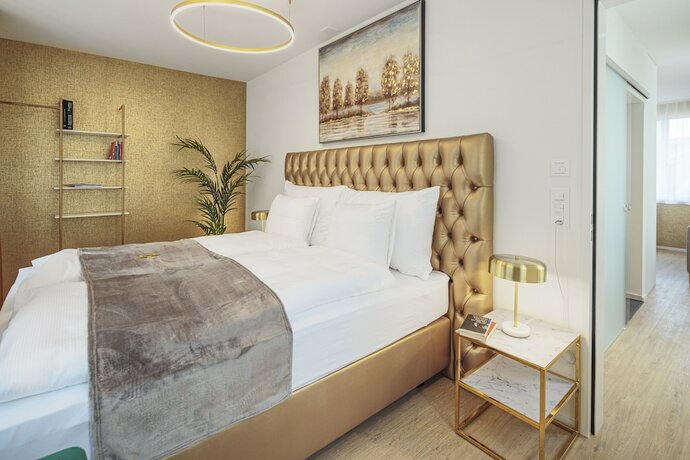 Imagen de la habitación del Hotel EH Apartments Merkur. Foto 19