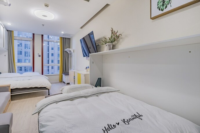 Imagen de la habitación del Hotel E-Homes. Foto 12