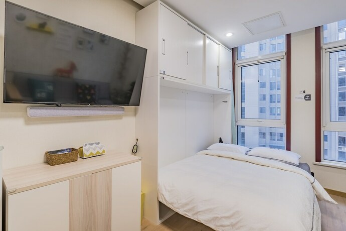 Imagen de la habitación del Hotel E-Homes. Foto 18