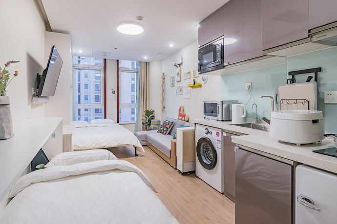 Imagen de la habitación del Hotel E-Homes. Foto 20