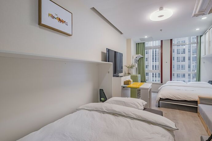 Imagen de la habitación del Hotel E-Homes. Foto 22
