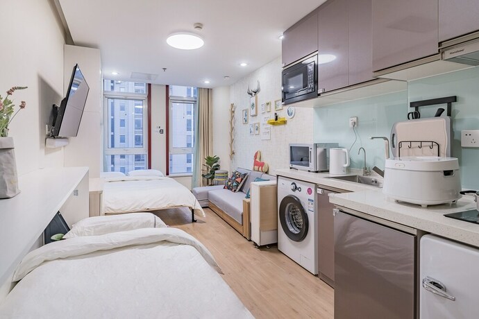 Imagen de la habitación del Hotel E-Homes. Foto 31