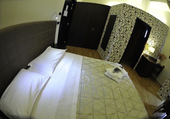 Imagen de la habitación del Hotel EKK. Foto 16