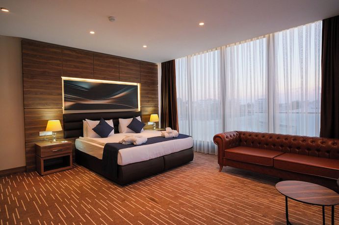Imagen de la habitación del Hotel EKOR ELEGANCE. Foto 4