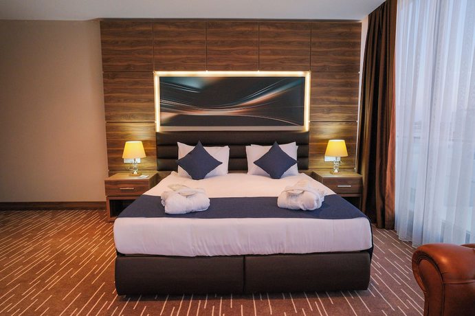 Imagen de la habitación del Hotel EKOR ELEGANCE. Foto 12