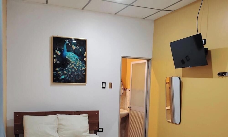 Imagen de la habitación del Hotel EL ENCANTO HOTEL. Foto 2