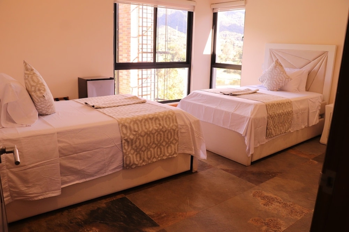 Imagen de la habitación del Hotel EL NIDO HOTEL GUATAPE. Foto 4