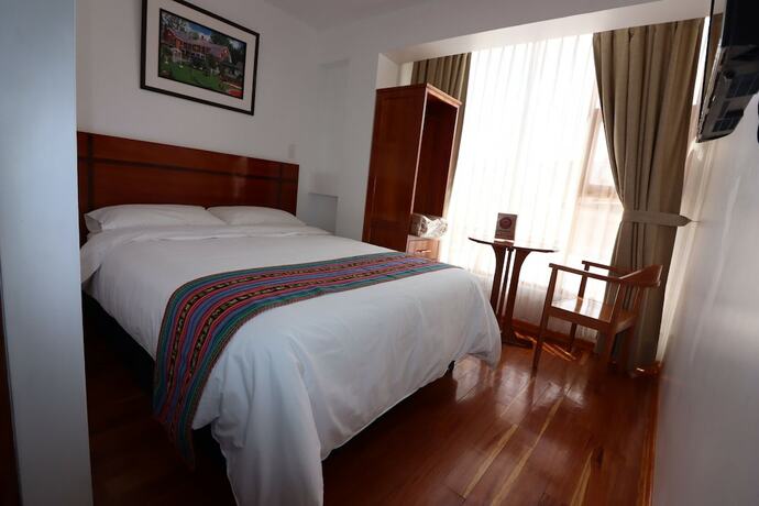 Imagen de la habitación del Hotel EL SOL HOSTAL URUBAMBA. Foto 7