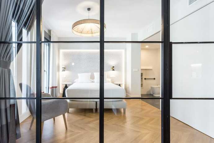 Imagen de la habitación del Hotel ELEVEN Apartments Real de la Carretería, by Homing U. Foto 11