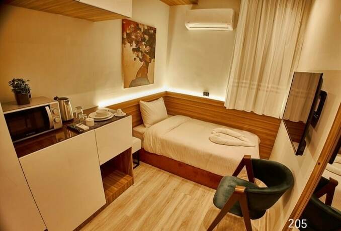 Imagen de la habitación del Hotel ELITE MOTEL. Foto 13