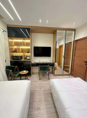 Imagen de la habitación del Hotel ELITE MOTEL. Foto 14