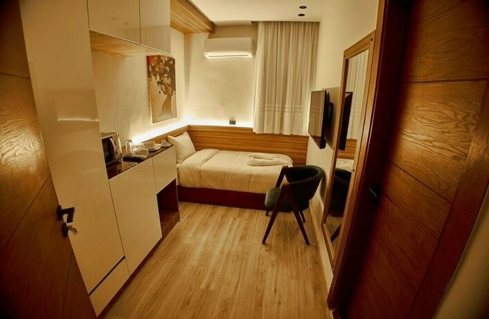 Imagen de la habitación del Hotel ELITE MOTEL. Foto 19