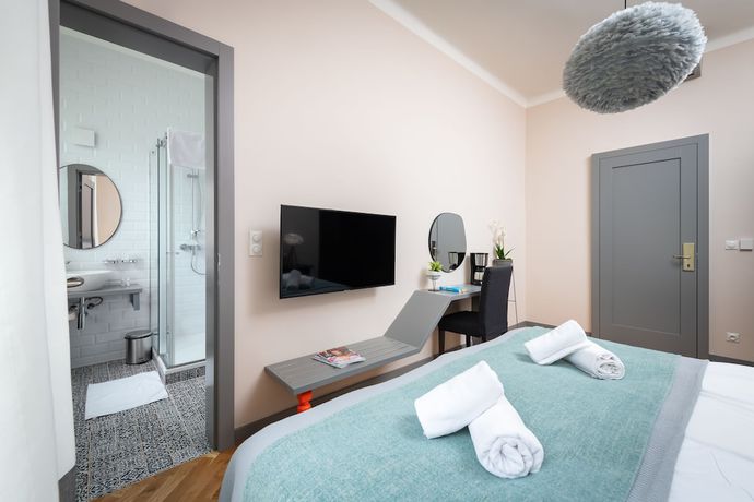 Imagen de la habitación del Hotel EMPIRENT Garden Suites. Foto 3