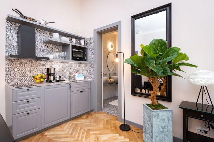 Imagen de la habitación del Hotel EMPIRENT Garden Suites. Foto 5