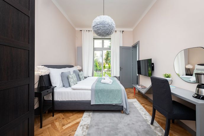 Imagen de la habitación del Hotel EMPIRENT Garden Suites. Foto 10