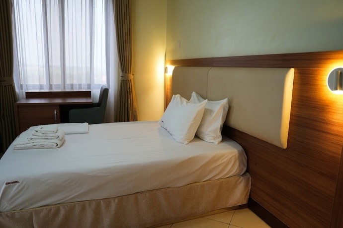 Imagen de la habitación del Hotel ENN Business hotel. Foto 5