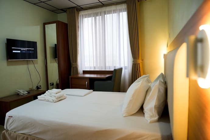 Imagen de la habitación del Hotel ENN Business hotel. Foto 6