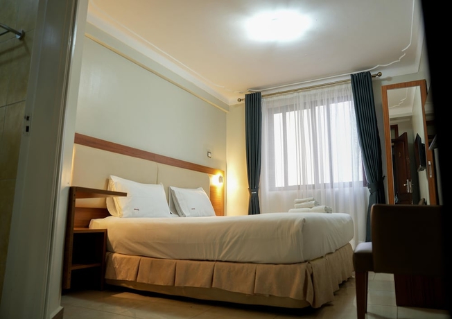 Imagen de la habitación del Hotel ENN Business hotel. Foto 7