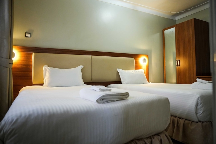 Imagen de la habitación del Hotel ENN Business hotel. Foto 8