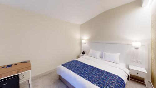 Imagen de la habitación del Hotel EPIGRAPH TOWN HOTEL. Foto 7