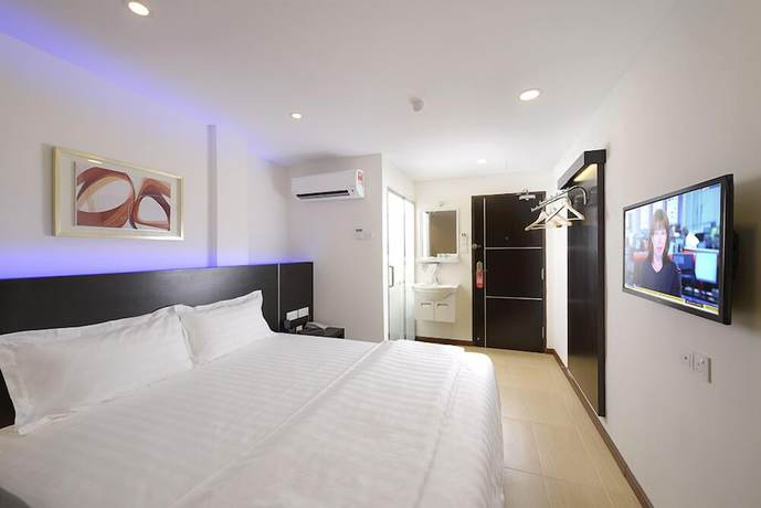Imagen de la habitación del Hotel E-Red Bayu Mutiara. Foto 3