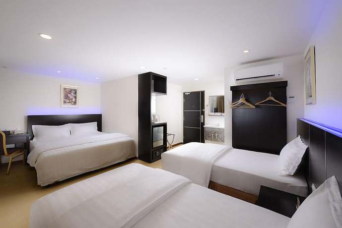Imagen de la habitación del Hotel E-Red Bayu Mutiara. Foto 6