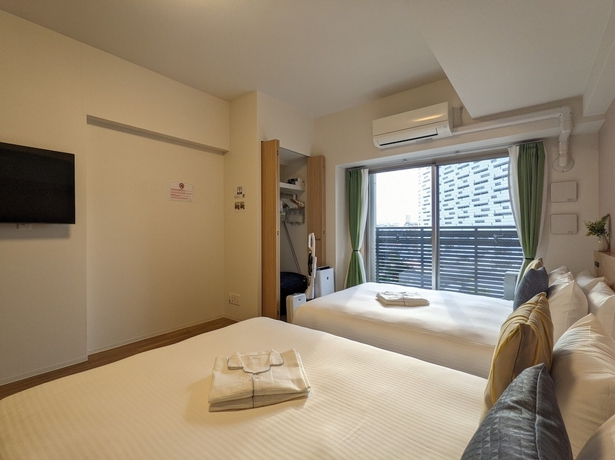 Imagen de la habitación del Hotel ESLEAD HOTEL Osaka Ebisu. Foto 10