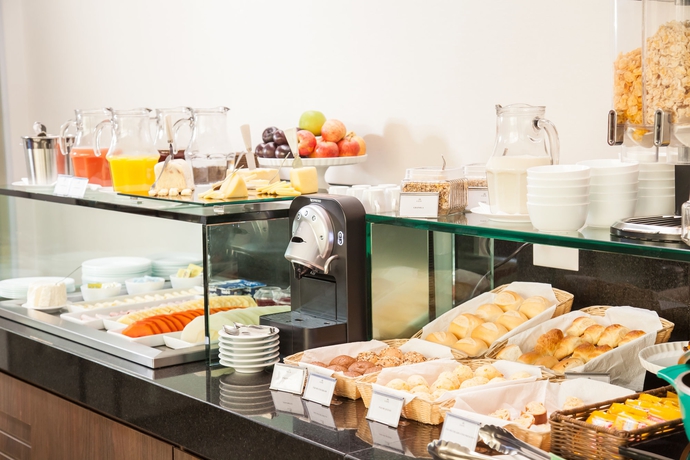 Imagen del bar/restaurante del Hotel E.Suítes Sion. Foto 5