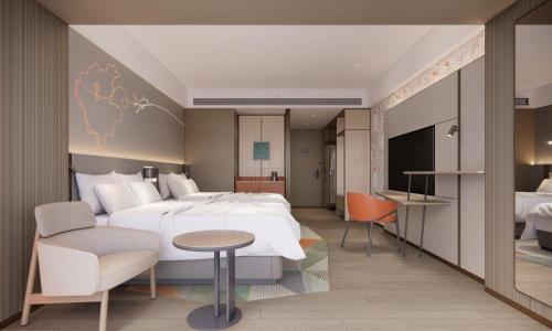 Imagen de la habitación del Hotel EVEN Linyi Airport Zone, an IHG. Foto 8