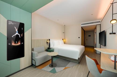Imagen de la habitación del Hotel EVEN Qingdao Laoshan - an IHG. Foto 11