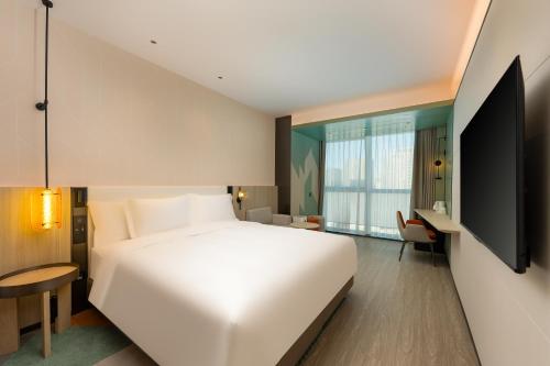 Imagen de la habitación del Hotel EVEN Qingdao Laoshan - an IHG. Foto 18