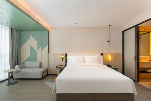 Imagen de la habitación del Hotel EVEN Qingdao Laoshan - an IHG. Foto 19