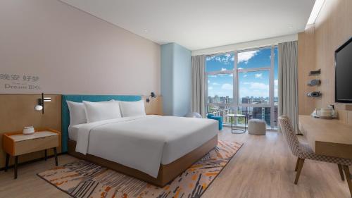 Imagen de la habitación del Hotel EVEN Yinchuan Yuehai, an IHG. Foto 12